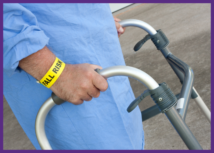 photo of a man with a fall risk bracelet on his wrist, walking with a walker - patients fall in hospitals due to weakness