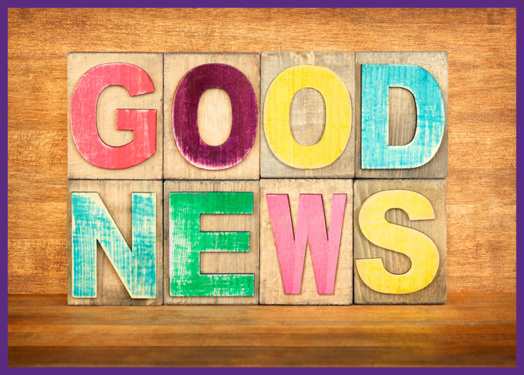 photo of wood blocks spelling out Good News on a wooden background 