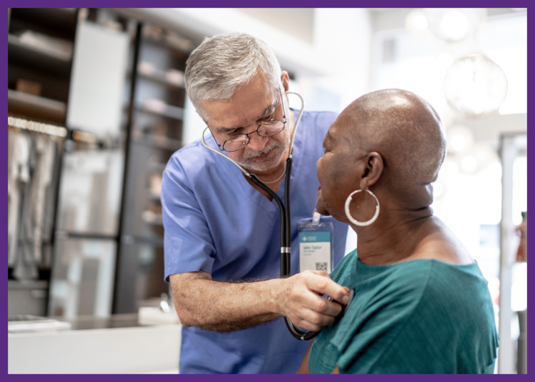 photo of a male doctor listening to the heart of a bald female cancer patient - talk to your doctor about the benefits of palliative care